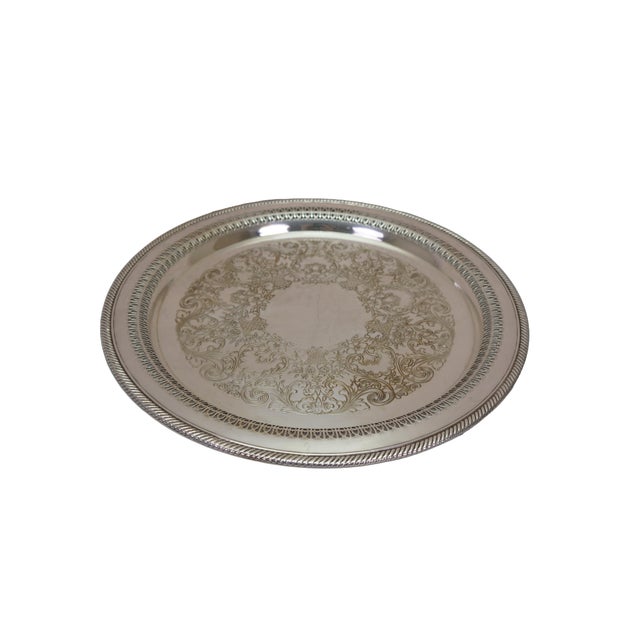 Three vintage silverplate bar butler serving trays platters. Two round (one pierced / reticulated) and one rectangular...
