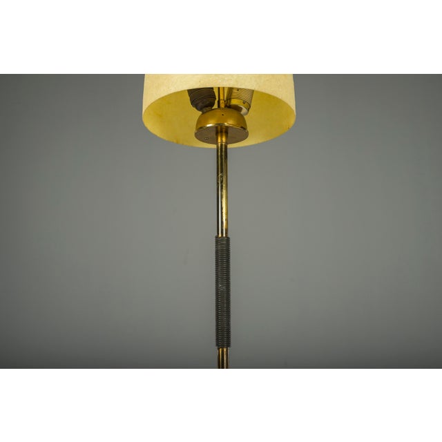 Filigree Lamp, fiberglass shade, brass stem with black nylon cord grip and cast iron tripod base. European Plug (up to...