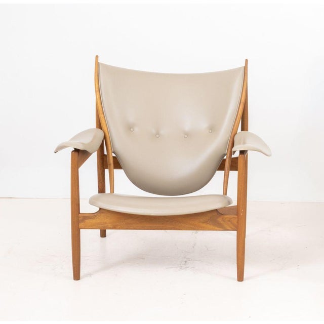 Finn Juhl (Danish, 1912-1989) "Chieftain" Lounge Chair, teak wood frame and tan leather upholstery, with "One Collection /...