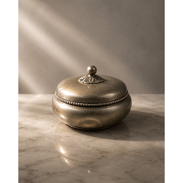 Rare circular box by the celebrated danish designer just andersen 1884 to 1943. Dated 1931 and crafted in the specific mt...