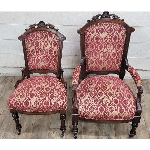 This is an absolutely stunning pair of antique Victorian Eastlake gorgeously carved parlor chairs with one side chair and...