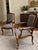 Set of two armchairs by Asnaghi Interiors, crafted in a Baroque Rococo style. The armchairs have ornate carved wooden...