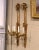 Gold Pair of Vintage French Louis XVI Style Carved Giltwood Three-Light Wall Sconces For Sale - Image 8 of 9