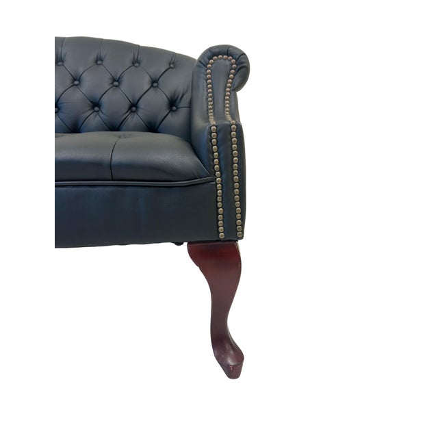 Make a striking statement with this elegant Queen Anne style loveseat, featuring a beautifully sculpted pin-cushion back...