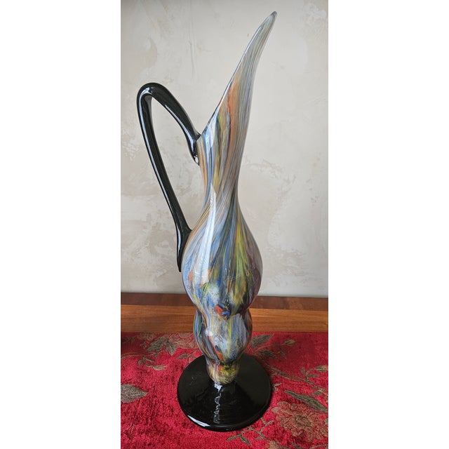An exceptional pair of authentic French Art Deco hand-blown art glass pitchers by Degue (Cristallerie Degué), dating to...