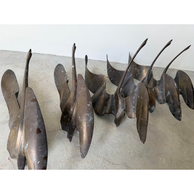 Beautiful vintage set of five flying birds wall sculptures crafted in solid brass. Each bird features a sculptural,...