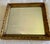 Antique French Mirror with French Bee Design on Frame. Color is deep gold patina and the frame is guilded. Mirror is...