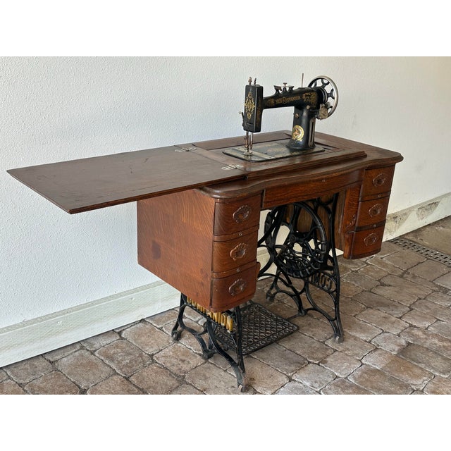 Retailer: Perry Mason Company Manufacturer: The New Home Sewing Machine Company Country of Origin: USA Age: Estimated...