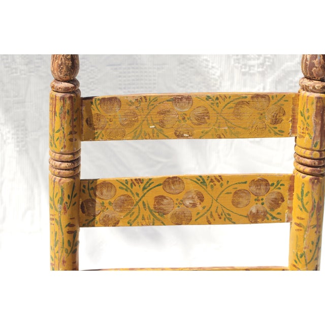Handpainted and handmade yellow chair with folk art flowers. Typical of Mexican craft but hard to find adult size. Mexican...