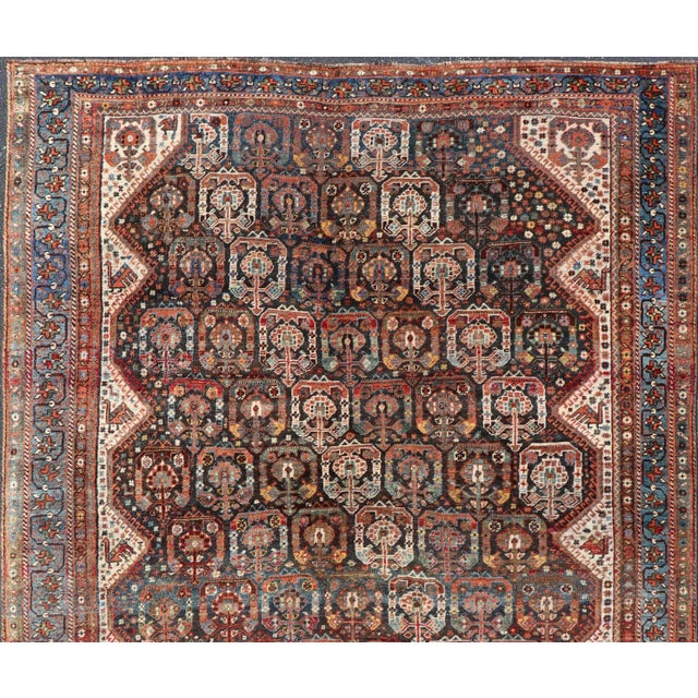 Ivory Antique Persian Qashqai Rug With Intricate Tribal Motifs and Rich Color Palette 6'10"x9'3" For Sale - Image 8 of 11