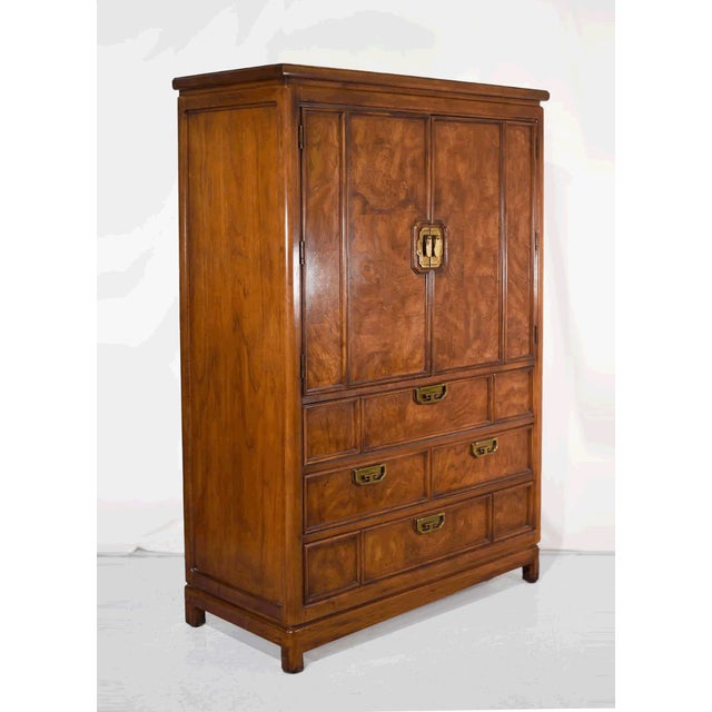 This 1970s Chinoiserie Burlwood Armoire Mystique by Thomasville Furniture is a stunning example of vintage craftsmanship...