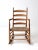 This is an antique splint weave seat rocking chair. The rustic, handmade rocker features a ladder back with herringbone...