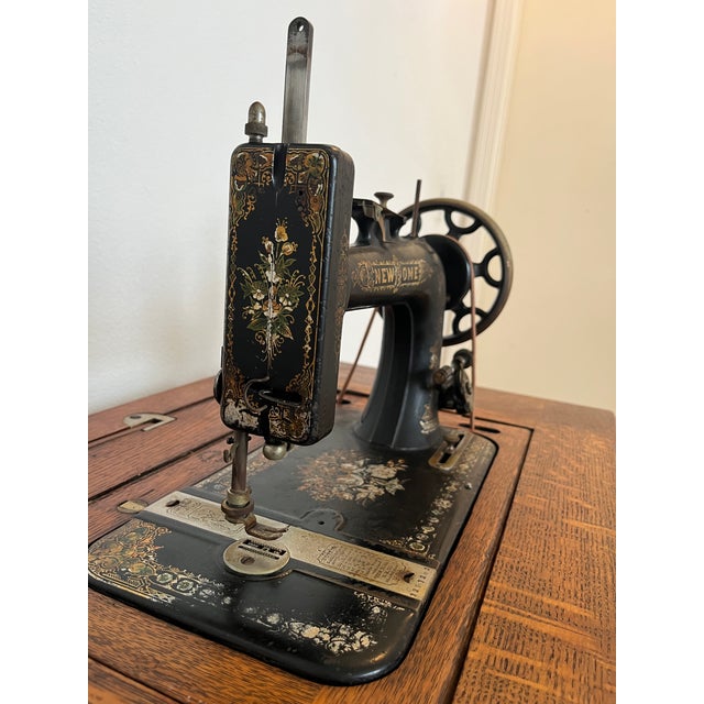 Own a piece of history -- simply wonderful antique treadle sewing machine that has never been electrified and stayed...