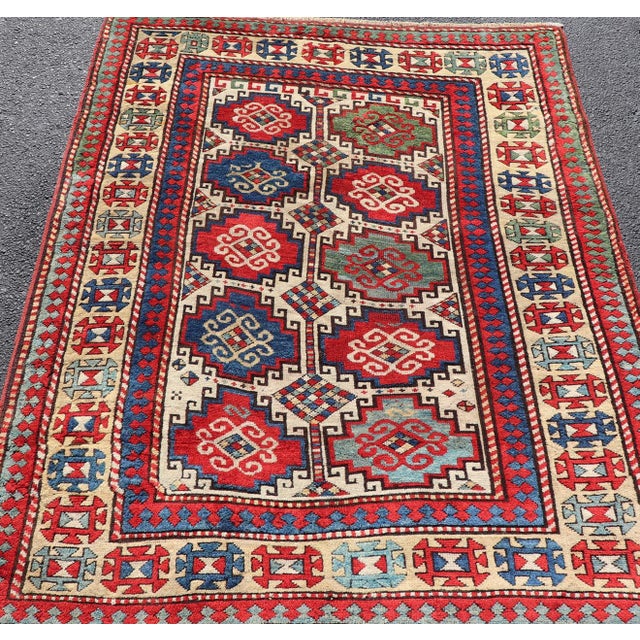 Late 19th Century Antique Moghan Kazak Rug Showcasing Bold Geometric Medallions 4'6 X 6' For Sale - Image 5 of 11