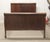 Solid walnut full size sleigh bed with walnut veneer. The rich dark tones and gentle curves give this bed frame a refined...