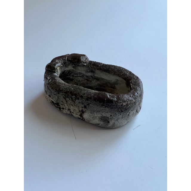 Whimsical handmade pottery dachshund catchall. This little piece is perfect for small items like earrings, necklaces,...