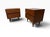A striking pair of Mid-Century Modern walnut nightstands by American of Martinsville, dating to the 1960s. Expertly...