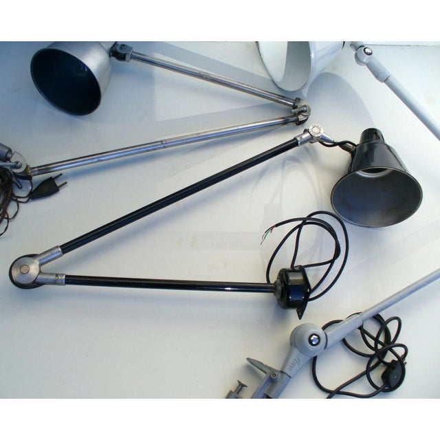 Set of three industrial table lamps, manufactured in Italy. The black and aluminium lamps were manufactured in the 1930s...