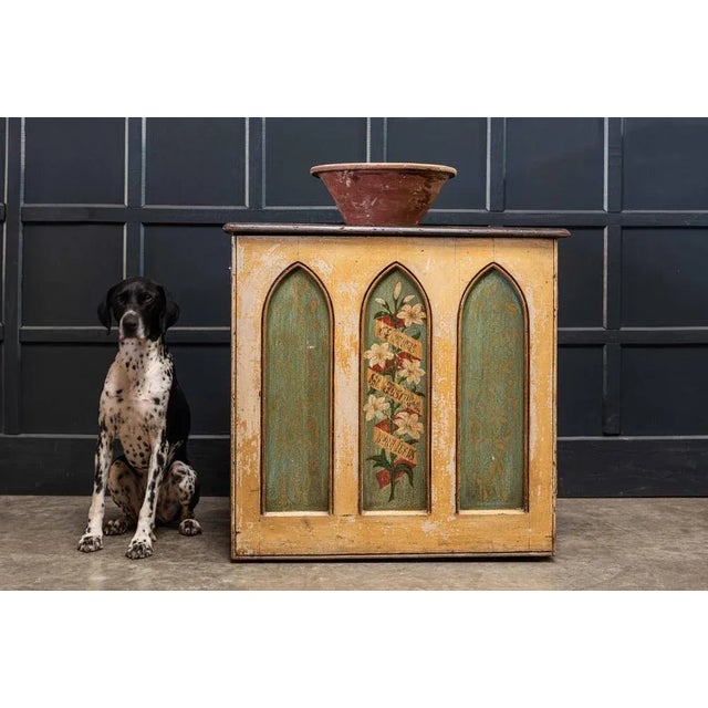 English Antique 19th century decorative painted chapel cupboard circa 1860. The 3 Gothic arc panels, painted with a dark...
