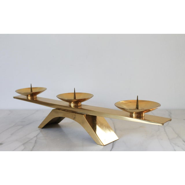 Vintage modernist brass candle holder. Made in Japan. Some patina and age wear to brass.
