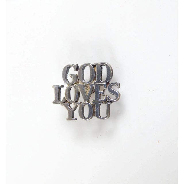 Vintage late 20th century Tiffany sterling silver "God Loves You" lapel or tie pin. Marked on back, 1/2" sq. good condition.