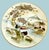Hand‑painted Japanese Kutani plates, measuring 7.25” and featuring birds, cherry blossoms, and a serene mountain...