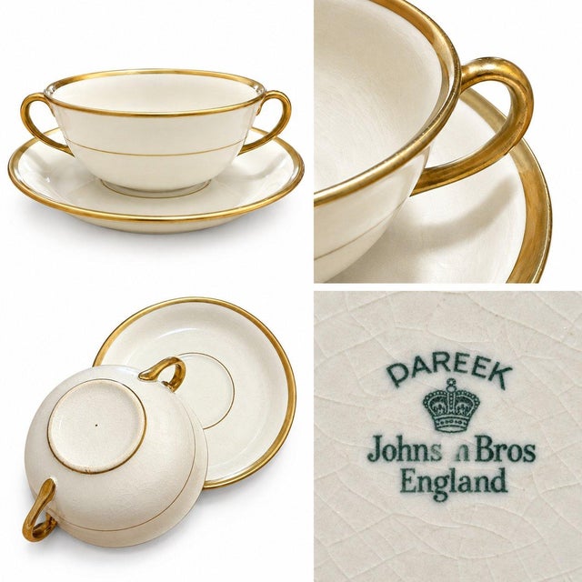 A beautiful Johnson Brothers Pareek ivory porcelain soup cup with two elegant handles and delicate gold trim, paired with...