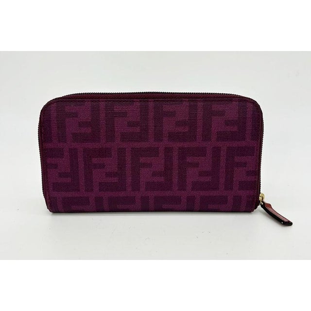 Fendi Purple Zucca Coated Canvas Long Wallet in excellent condition. Purple zucca coated canvas trimmed with matching...