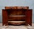 Napoleon III period mahogany sideboard, curved on all sides Front opening with 2 leaves and 2 drawers Panelled sides...
