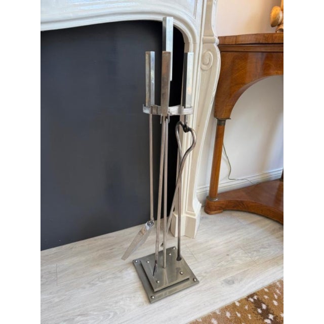 This is a polished nickel fireplace tool set by John Lyle. These sets are very high end and sold to the trade only. This...