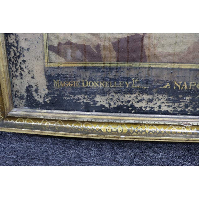 Framed Victorian needlepoint depicting Napoleon Bonaparte mounted on a mule while crossing the Alps, accompanied by...