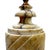 What could be more classic than a neoclassical urn carved from alabaster? Which features an ivory ground with brown and...