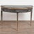 19th century Swedish demi lune side table, crafted in pine. The table has been given a newer professionally applied black...
