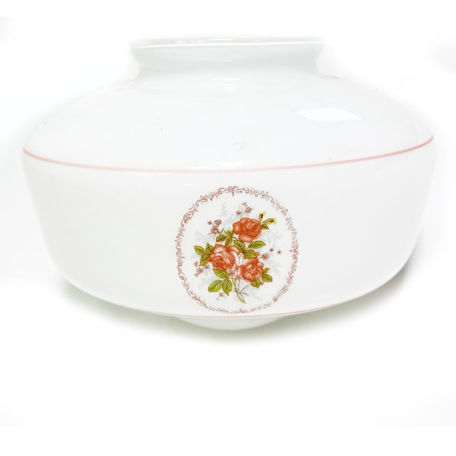 Sweetly romantic and full of vintage charm, this milk glass lamp shade features delicate rose bouquets blooming within...