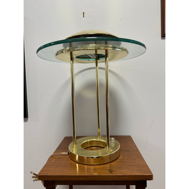 A postmodern icon in excellent vintage condition. Designed by Robert Sonneman for George Kovacs circa 1980, the Saturn...