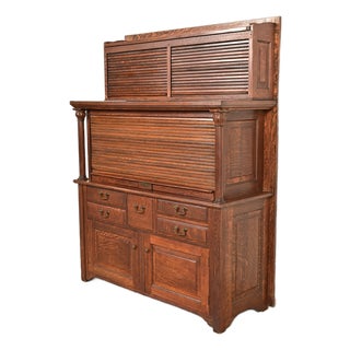 Antique Arts & Crafts Oak 27-Drawer Tambour Door Dental Cabinet by American Cabinet Co., Circa 1900 For Sale