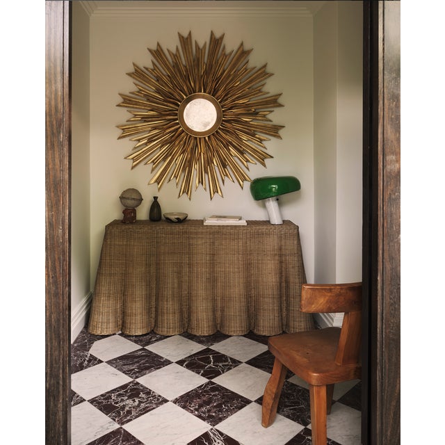 Restored sunburst mirror from 20th Century. Composed of a double row of gilded wooden rays and an minimal and...