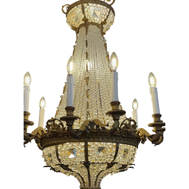 Rare French Belle Époque sac à perles chandelier, circa 1890, finely crafted in bronze with an impressive cascade of...