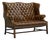 English Tufted Wingback Settee in Patinated Leather, 1900 For Sale