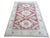 Vintage Turkish rug, hand-knotted in Turkey from 100% wool. Measuring 6’9” x 9’7”, the rug features a bold traditional...