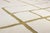 Elegant hand-knotted wool rug in soft Ivory, highlighted by geometric lines in Green Olive. The clean, structured design...