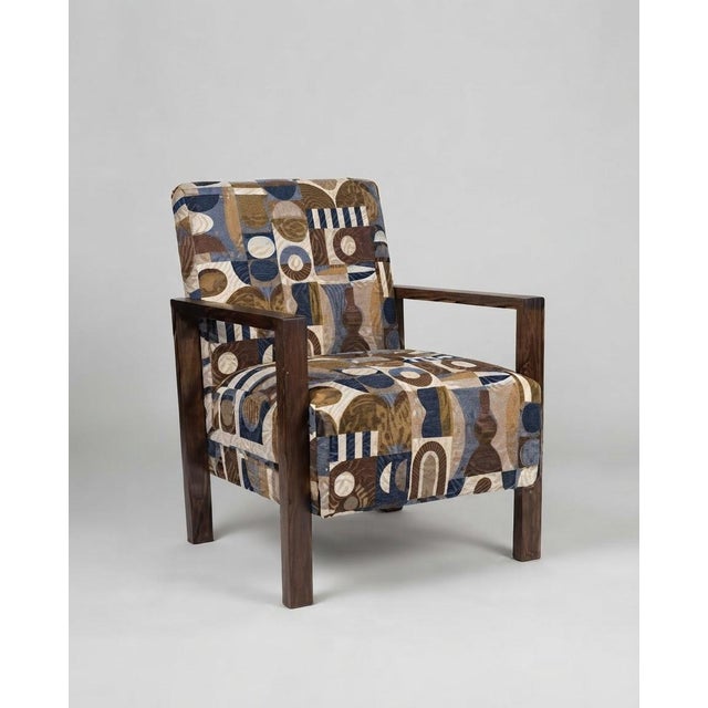 A striking and bold matching pair of fully refurbished Hungarian Art Deco lounge armchairs, combining classic 1930s...