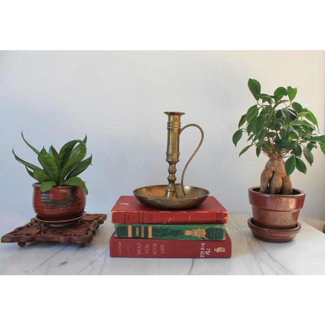 Vintage brass taper candle holder. Age wear, patina.