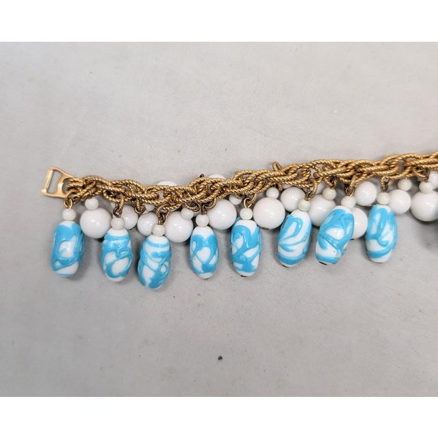 Napier Vintage Napier Book Piece Goldtone Blue & Turquoise Art Glass Charm Bracelet, 1967 For Sale - Image 4 of 15
