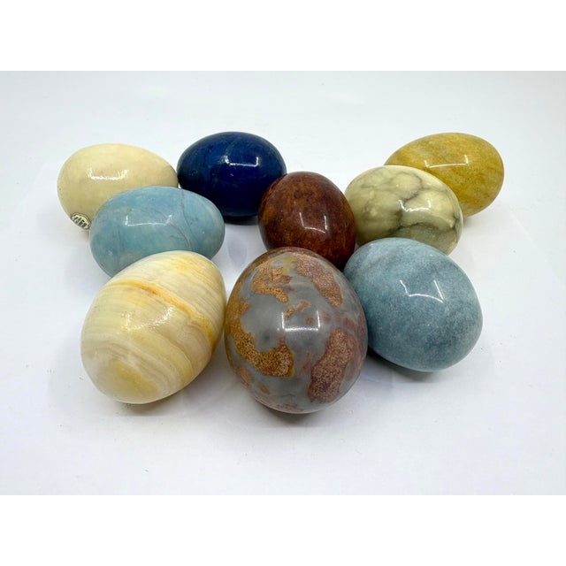 Vintage alabaster hand caved Easter eggs made in Italy. A variety of colors and sizes in browns, yellows and blues.