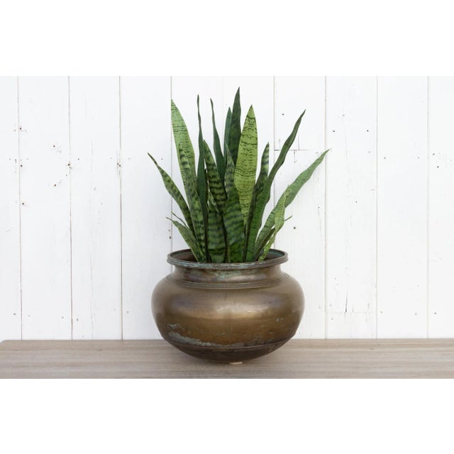 This antique brass container is an important part of India's cultural heritage. These type of antique containers were...