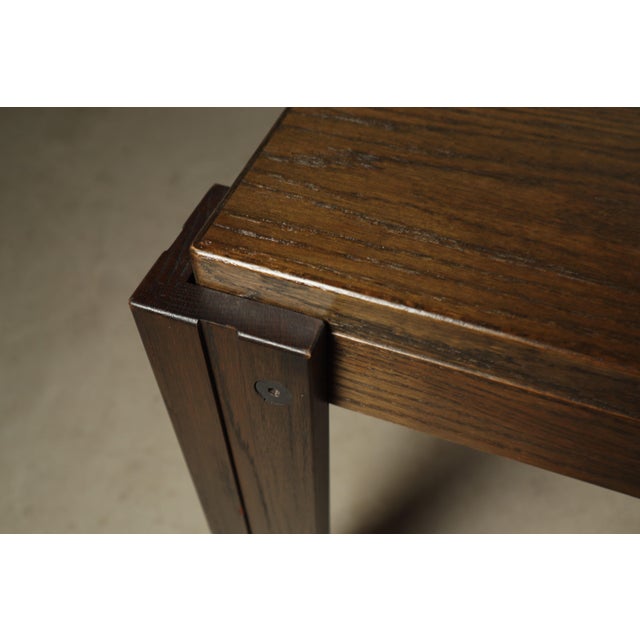 Extendable dining table produced by AZS Meubelen in Schoonhoven, the Netherlands, during the 1970s. The table features a...