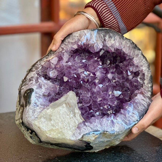 One-of-a-kind sculptural mineral specimen featuring a remarkable natural combination of amethyst, agate, and calcite. This...