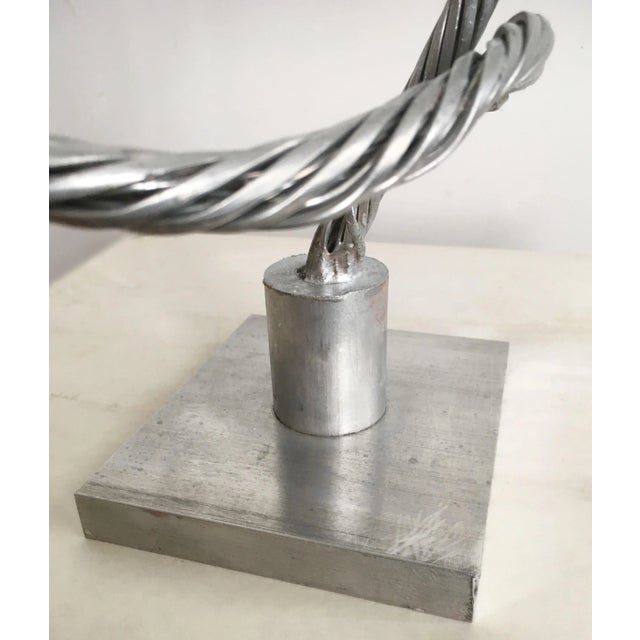 Aluminum wire sculpture. Calligraphic abstraction on aluminum base . One of a kind