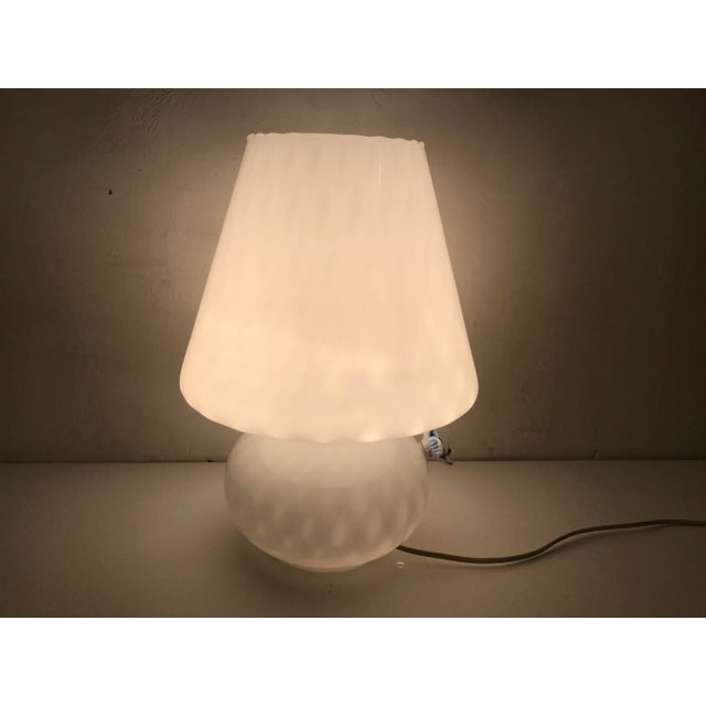 Murano glass lamp by Venini White textured Murano Glass with little blue Murano flower Features 1 light Requires E27 light...